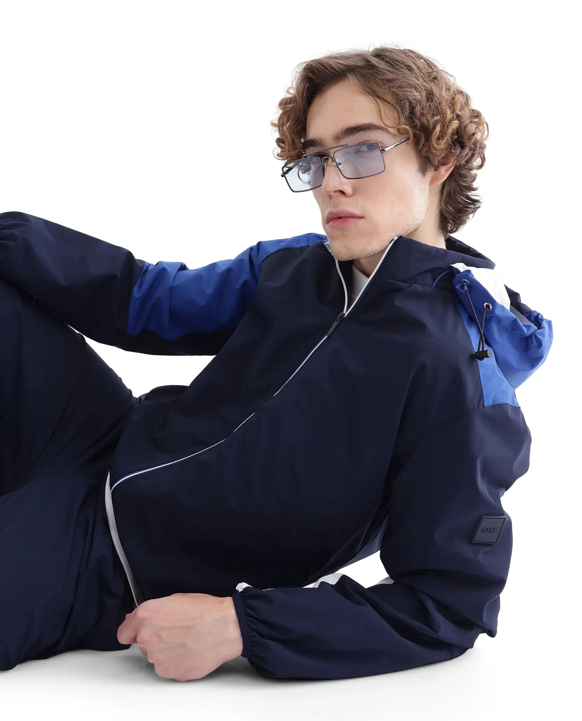 Rare Rabbit Men Wando Dark Blue Polyester Fabric Full Sleeve Hooded Zipper Closure Colorblock Jacket